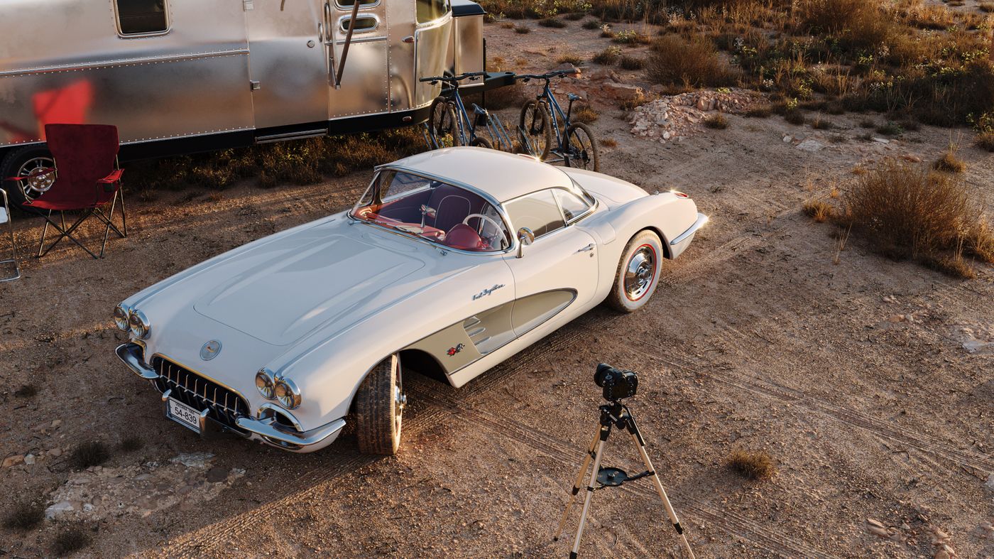 Restored trailer parked with a classic car